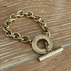 Coach Gold Link Bracelet with Toggle Clasp
Vintage- Coach.  7 in
